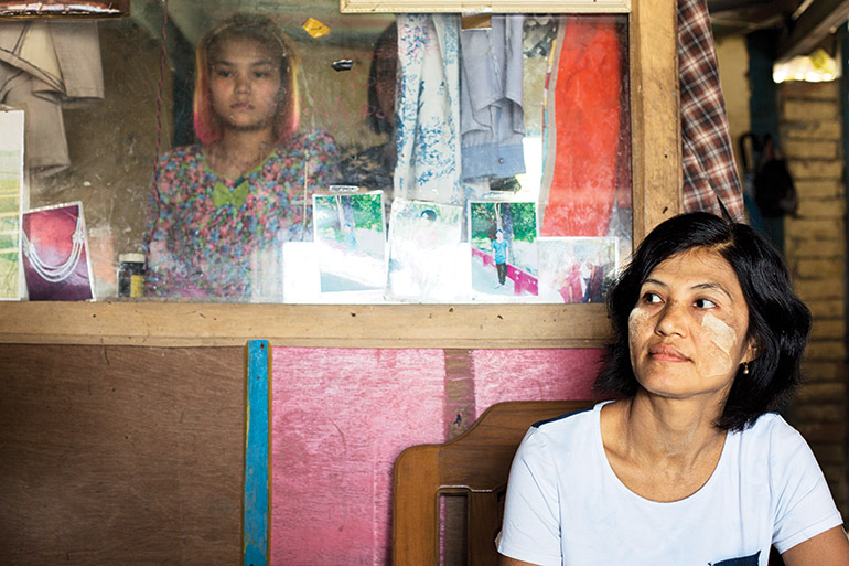 Khin Thein, chair of the local chapter of the Rakhine Women’s Network, in her jewellery shop