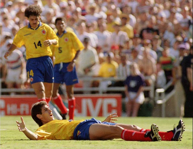 Sudden death: Andres Escobar scores the own goal at the 1994 World Cup that would eventually lead to his murder