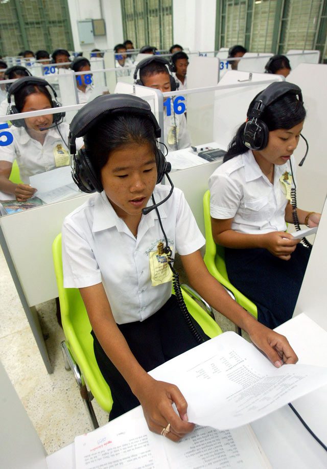 Photos: Bazuki Muhammad, Chor Sokunthea, both Reuters. Language learners: Cambodian children attend an English class in Kampong Thom province