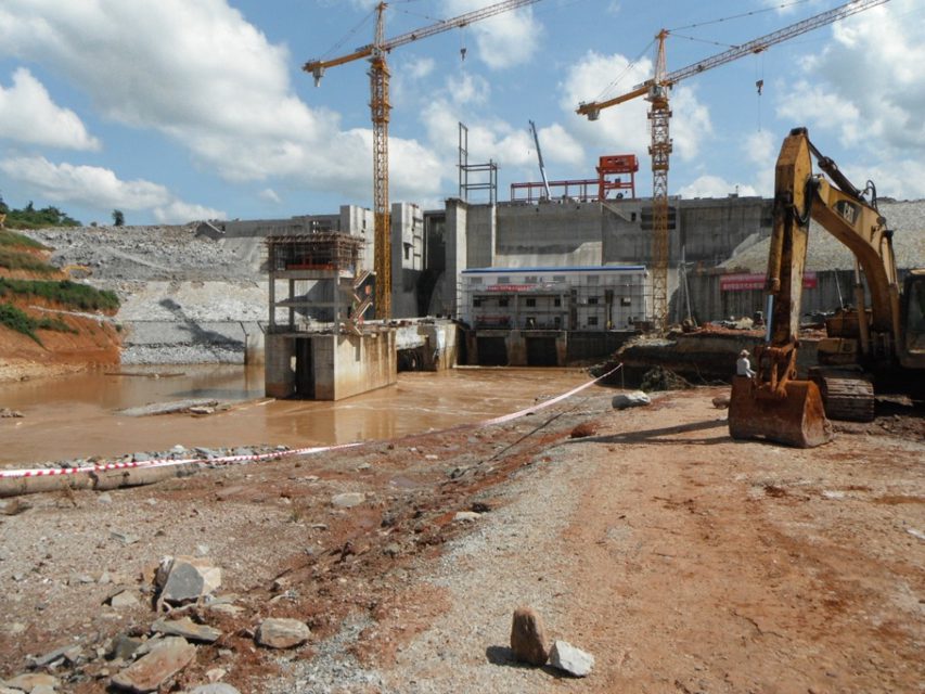 Photo by The Cambodia Daily. Water surge: a large section of the Stung Atay dam collapsed last month, killing three workers.