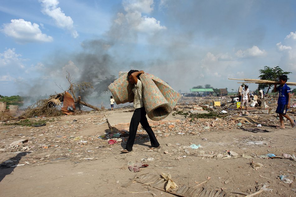 Long walk: Cambodians who are displaced due to infrastructure projects rarely receive adequate compensation due to a lack of clear legislation