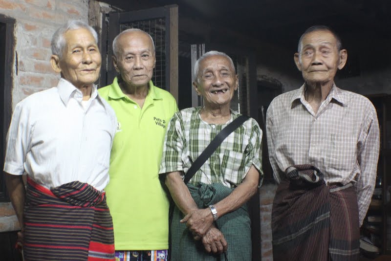 Photo by Mark Fenn. Gang of four: (from left) Karen veterans Saw Yakhin, Saw Chitpe, Saw Nogie and Saw Polaw at the home of a Burma Forces Welfare Association organiser