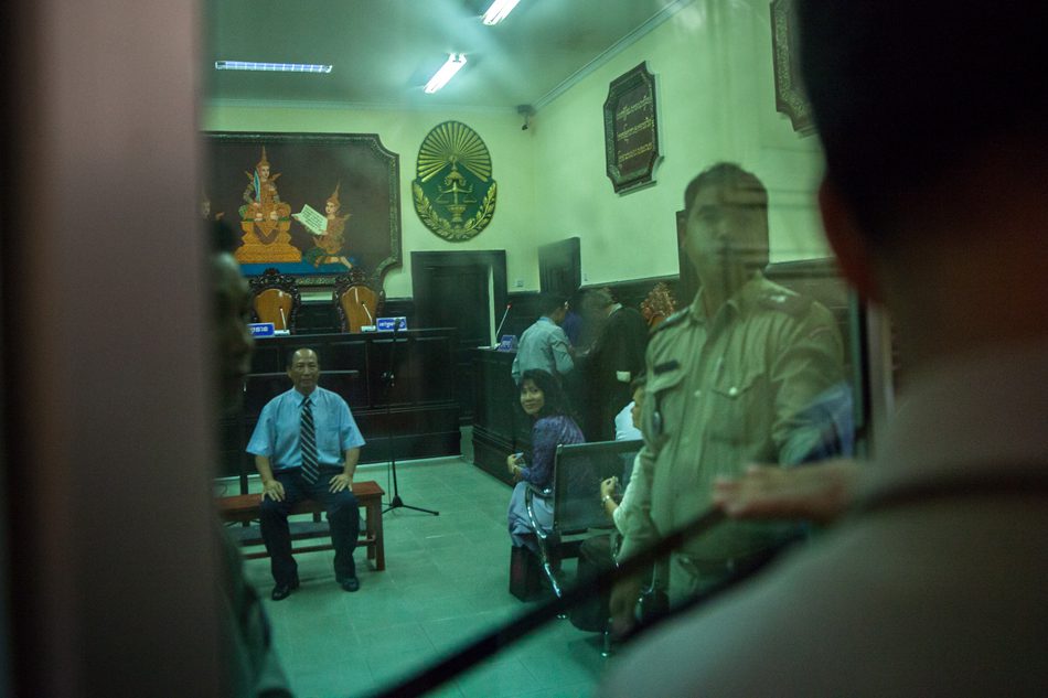 Photo by Erika Pineros.Trumped up: Mam Sonando waits for the verdict on his appeal for bail at the appeal court in Phnom Penh