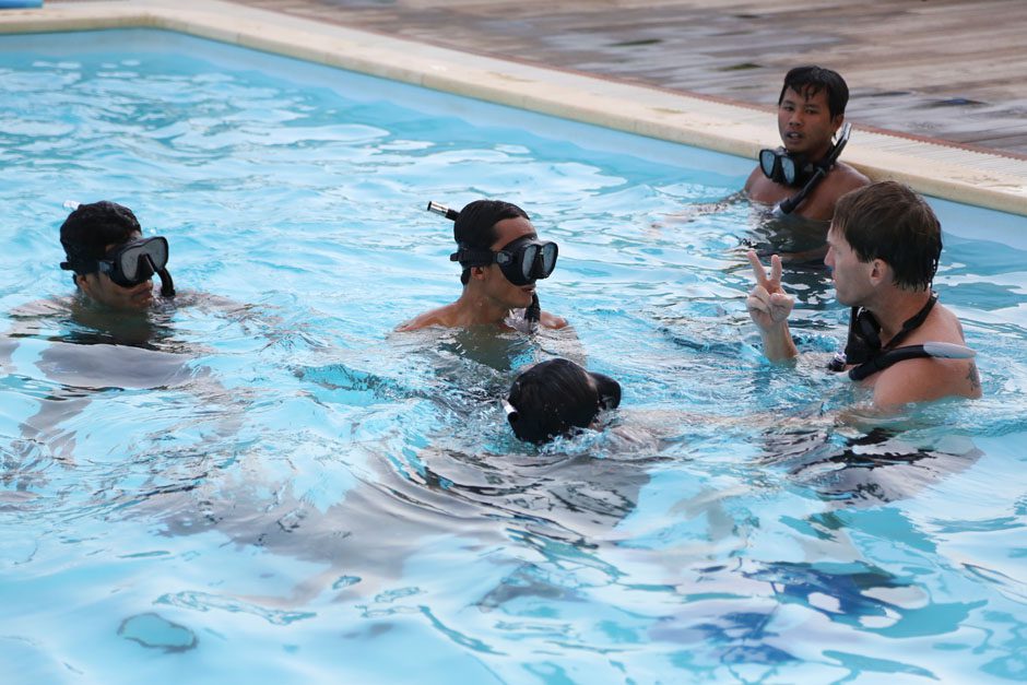 Photo by Todd Brown.Motivator: lead instructor Robert Rice gives lessons to would-be salvage divers 