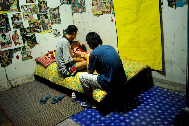 Clouded: two teenagers prepare to smoke meth in the back room of a boxing stadium. Agnes Dherbeys