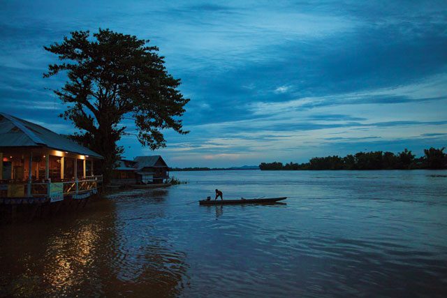 A fisherman on the Mekong River near the Don Sahong dam site