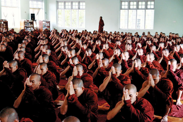 Respect: a sea of monks at a monastery in Sagaing, where the holymen are summoned each day at 5pm for group prayer. Bruno Barbey (France)