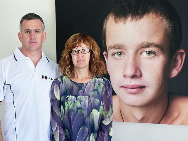 Continued struggle: Tim and Lhani Davies with a photo of their son Liam who died from methanol poisoning