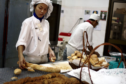 Work it out: female students learn how to cook at a vocational training center. Photo: Grzegorz Ostrega for SEA Globe