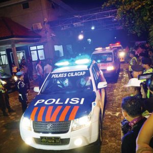 Body count: a police car leads ambulances carrying the bodies of five recently executed prisoners on January 18. Photo: Bayur Nu/EPA