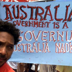 Rack off: an East Timorese youth joins a protest outside the Australian embassy in Dili in 2004 that called for an end to Australia’s oil explorations in the Timor Sea. Photo: Lirio Da Fonseca/Reuters