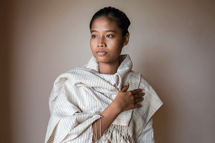 Model wears sarong made from lotus and silk