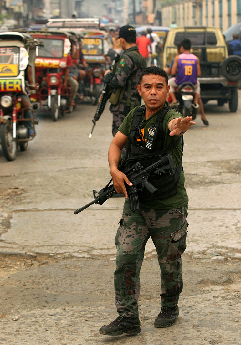 Philippine soldiers on patrol after attack by Islamic militants