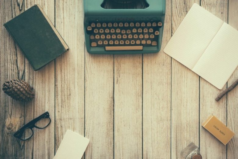 VIntage typewriter notebook on table