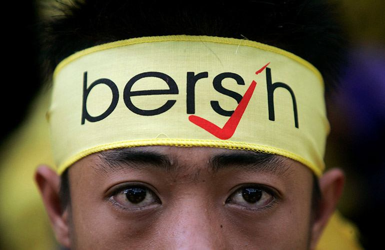 A Malaysian protester wears a headband which reads: "Bersih", or "Clean" in Malay, during a banned opposition rally demanding changes to the electoral system in Kuala Lumpur November 10, 2007.