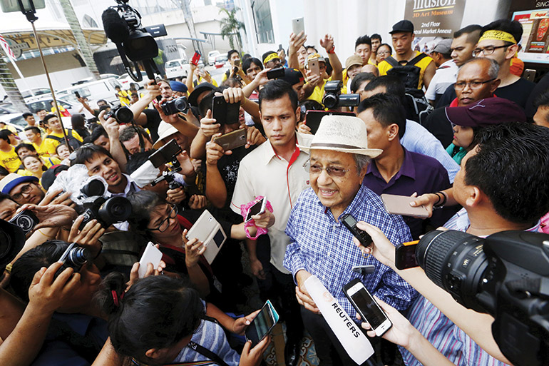 Former Prime Minister Mahathir Mohamad speaks at a 2015 Bersih rally