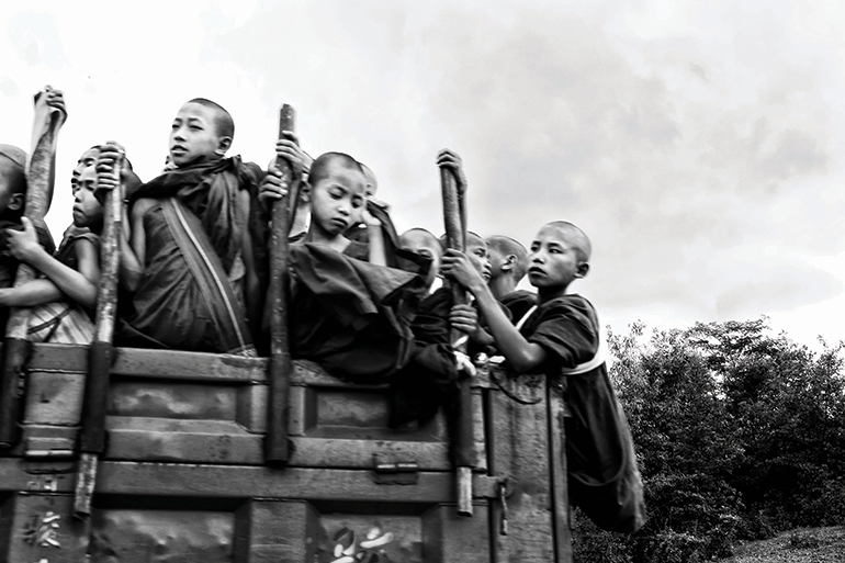 Novice monks travel from the Myanmar-China border town of Muse in northern Shan State