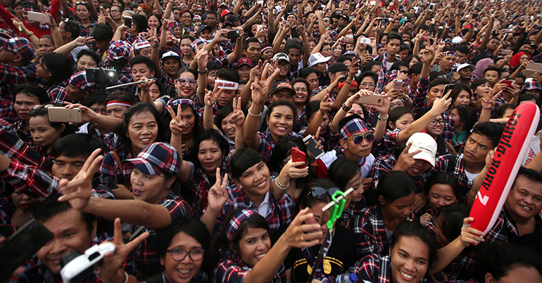 Supporters of Basuki 'Ahok' Tjahaja Purnama, Jakarta governor and his running mate Djarot Saiful Hidayat cheer during a campaign rally in Jakarta, Indonesia