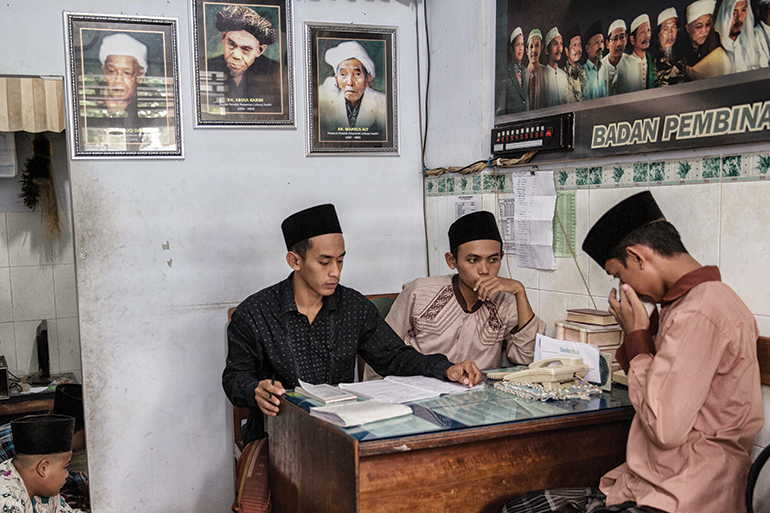 a student receives a phone call from his parents. Mobile phones are not allowed at the school