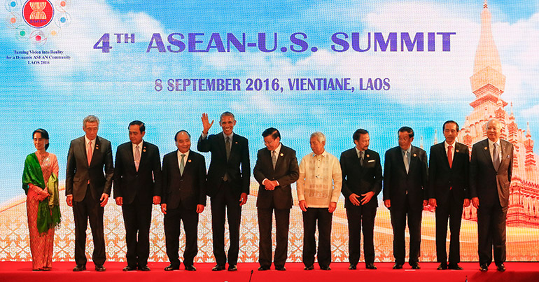 Asean heads of state, along with former US president Barack Obama, pose for photographs during the Association of Southeast Asian Nations (Asean) - US Summit at the National Convention Center in Vientiane