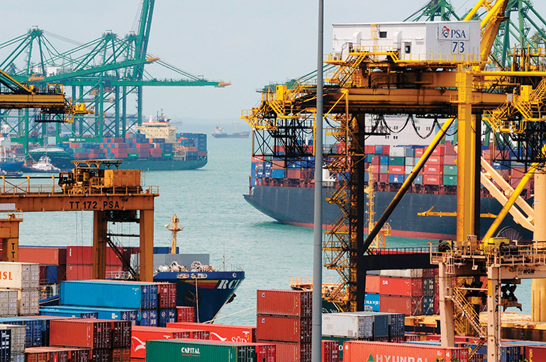 Cargo ships at a container port in Singapore