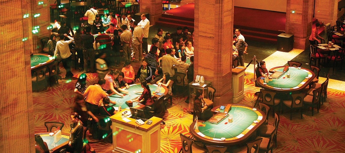 Card tables at NagaWorld casino in Phnom Penh. Photo: Nigel Dickinson