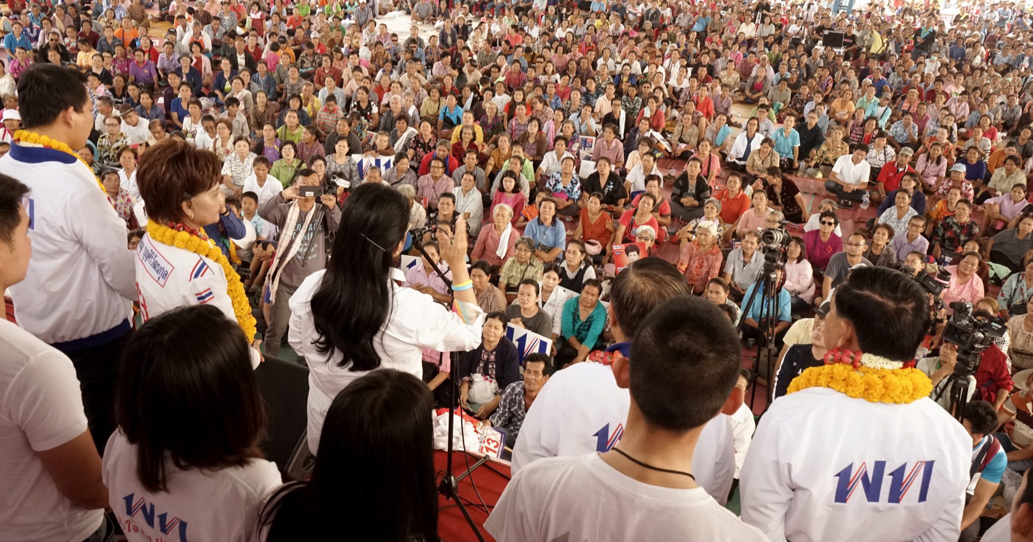 Pheu Thai party candidate for prime minister Sudarat Keyuraphan (C) speaks during a rally Photo: Aidan JONES / AFP