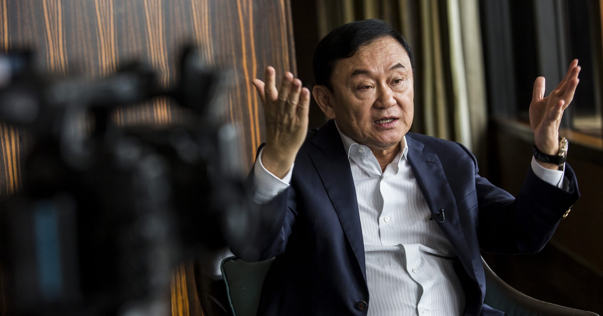 Exiled former Thai prime minister Thaksin Shinawatra being interviewed by Agence France-presse in Hong Kong. - Thaksin said Thai the election was 'rigged' and marred by 'irregularities' Photo: Issac Lawrence / AFP