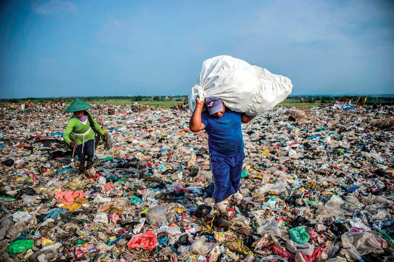 Scavengers collecting valuable waste are a common sight across Southeast Asia. Photo: Juni Kriswanto/AFP