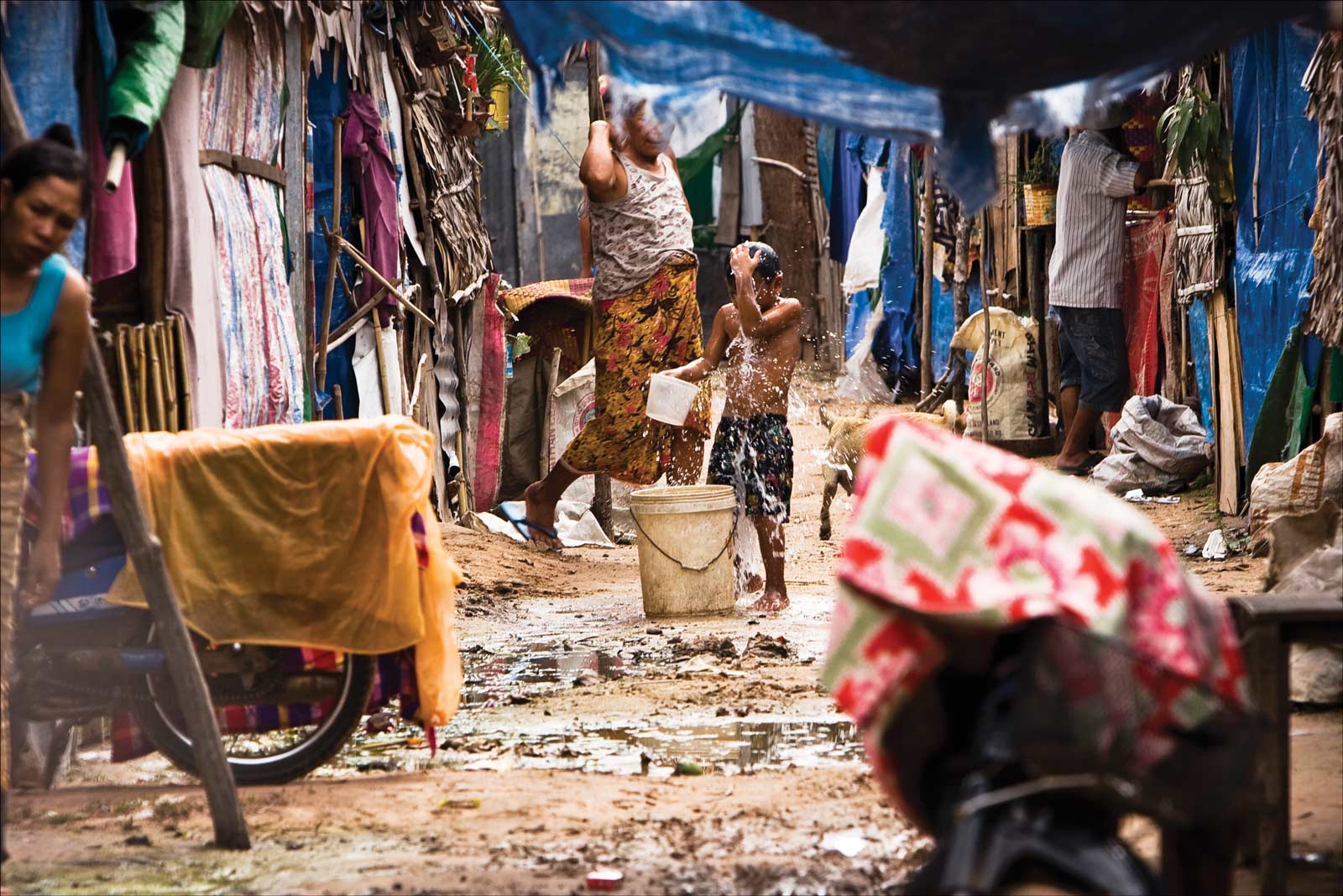 Bath time: sanitation is  a concern at the Andong  relocation camp