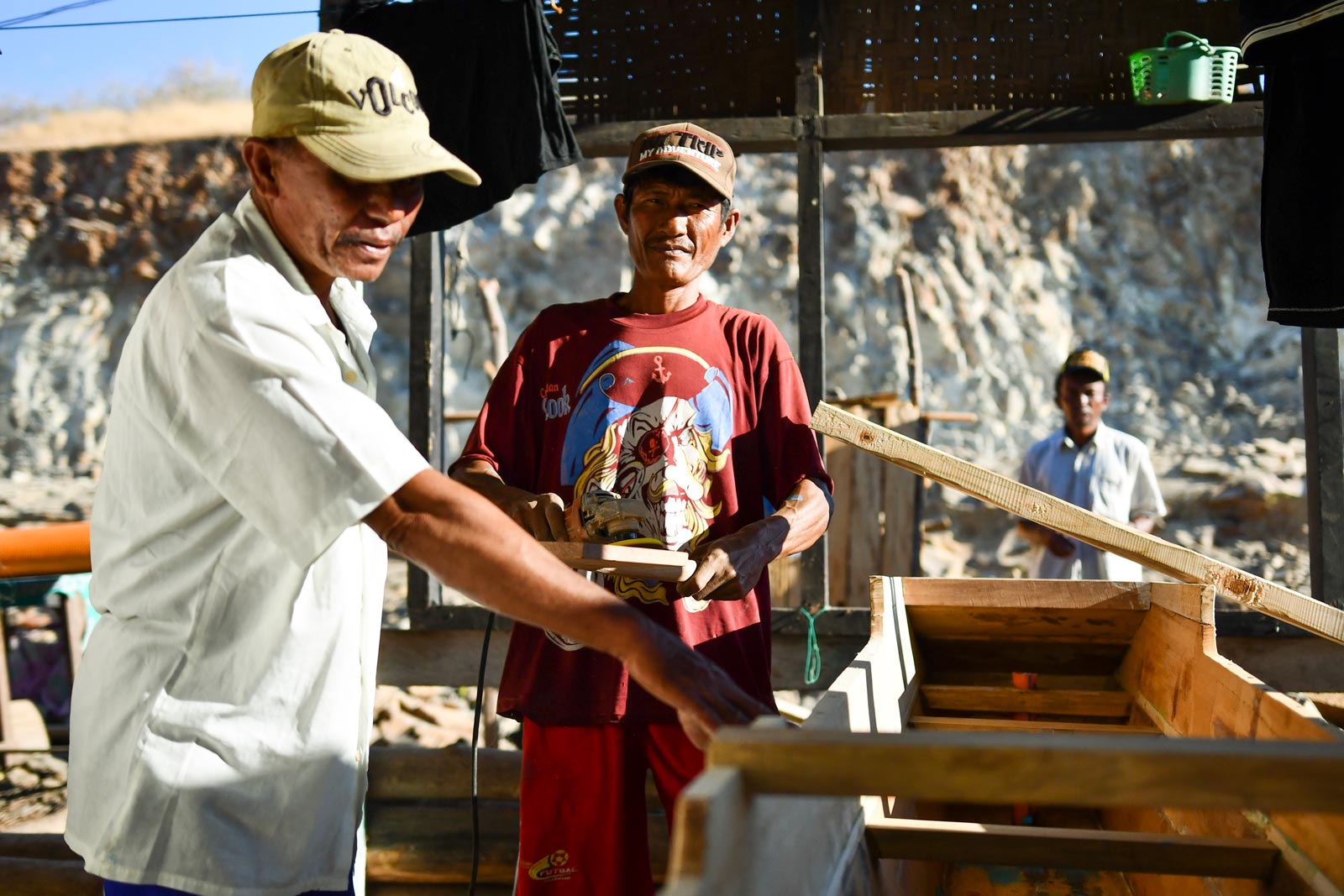 Zubaidi and team at work building fishing boats at Kwangko. Photo: Simon Roughneen