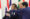 French President Emmanuel Macron (L), US President Donald J.Trump (C) and Japanese Prime Minister Shinzo Abe (R) prior to a session of the G20 summit in Osaka, Japan, 28 June 2019.