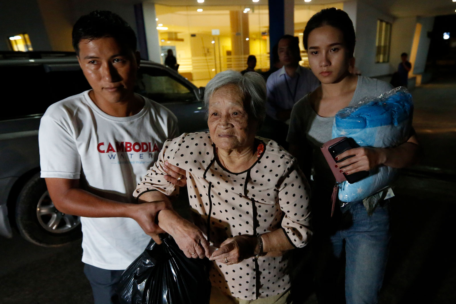 Noun Chea's wife Ly Kim Seng (C), walks out from a hospital after she visited her husband body in Phnom Penh, Cambodia, 04 August 2019. Photo: EPA-EFE/KITH SEREY