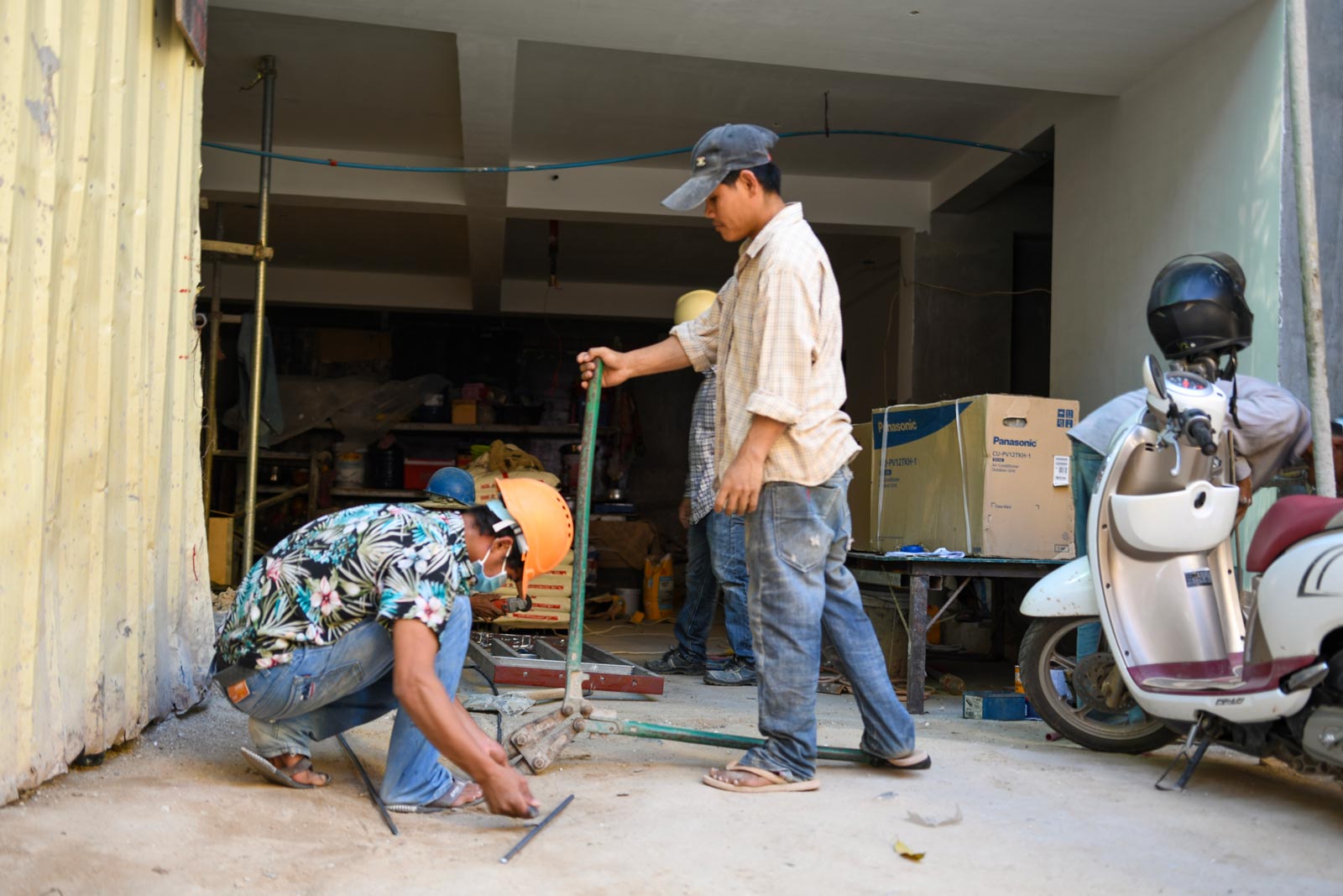 Protective footwear is not ubiquitous on Cambodian building sites. Photo: Simon Roughneen