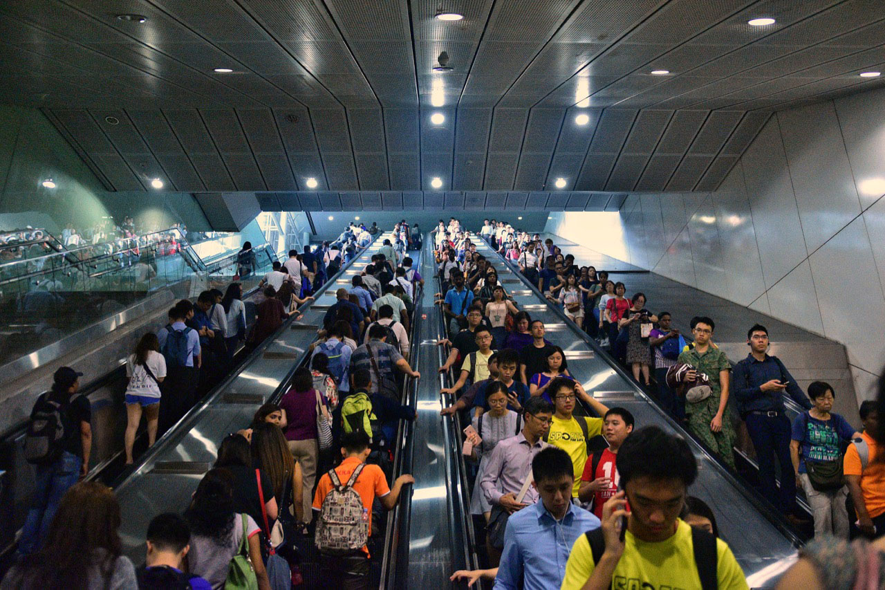 Singaporeans making their evening commute home from work via the city-state's metro system. Photo: Simon Roughneen