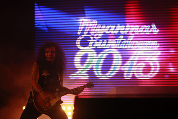 A Myanmar guitarist performs in Yangon on New Year's Eve 2012. Photo: EPA/Lynn Bo Bo