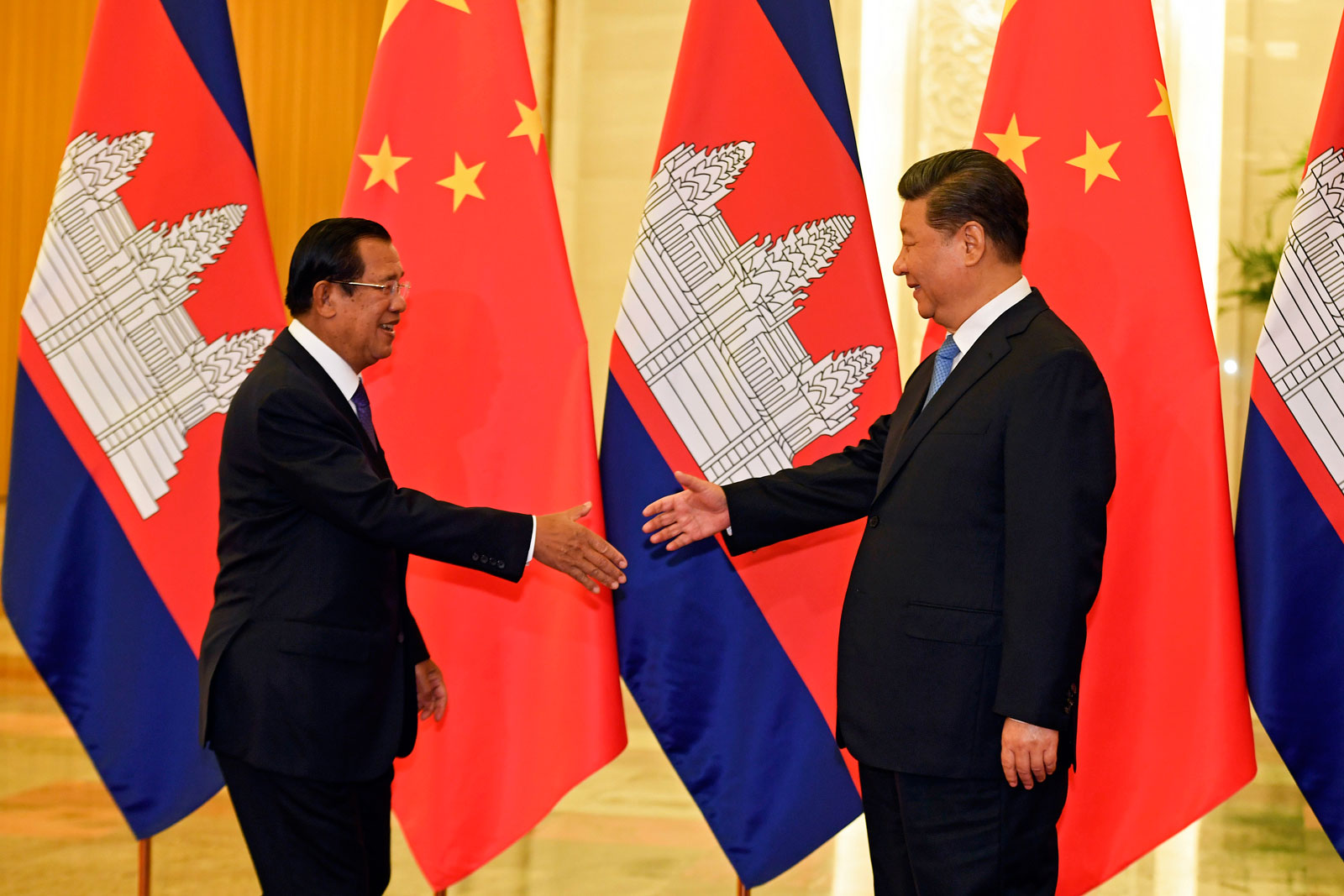 China's President Xi Jinping (R) shakes hands with Cambodia's Prime Minister Hun Sen (L) before their meeting at the Great Hall of the People in Beijing, China, 29 April 2019. EPA-EFE/Madoka Ikegami