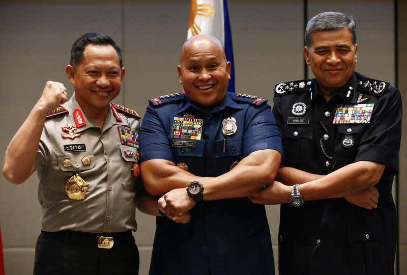 Indonesian Chief of National Police Tito Karnavian, Philippine National Police Director General Ronald Dela Rosa and Malaysian Police Inspector General Khalid Bin Abu Bakar during a meeting on security in June 2017. Photo: EPA/Rolex Dela Pena