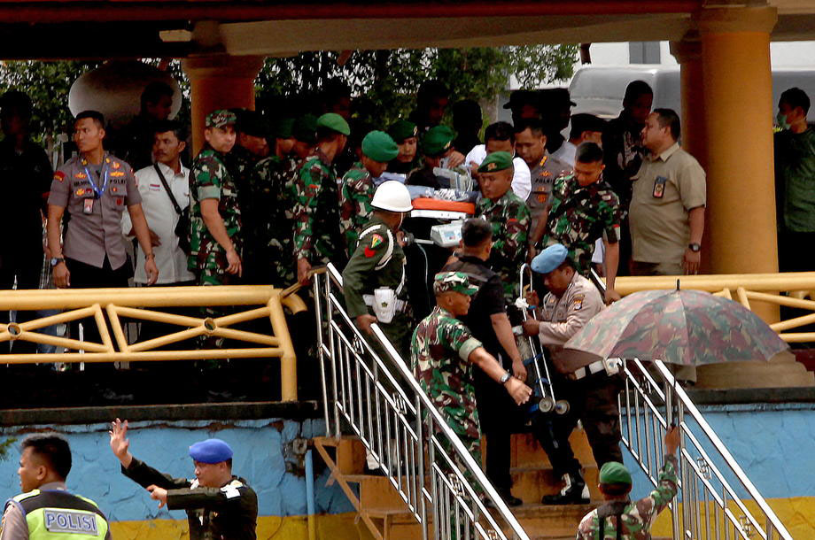 Indonesian security minister Wiranto being stretchered away being stabbed twice in Banten, Indonesia on 10 October 2019. Photo: EPA-EFE/ST