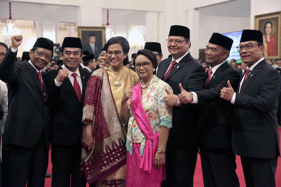 Indonesia's Coordinating Political Legal and Security Affairs Minister Mahfud MD, Religious Affairs Minister Fachrul Razi, Finance Minister Sri Mulyani Indrawati, Foreign Minister Retno LP Marsudi, Coordinating Economic Minister Airlangga Hartarto, Coordinating Human Development and Culture Minister Muhadjir Effendy and Presidential chief of Staff Moeldoko, after being sworn in as ministers at the Merdeka Palace in Jakarta, 23 October 2019. Photo: EPA-EFE/Adi Weda