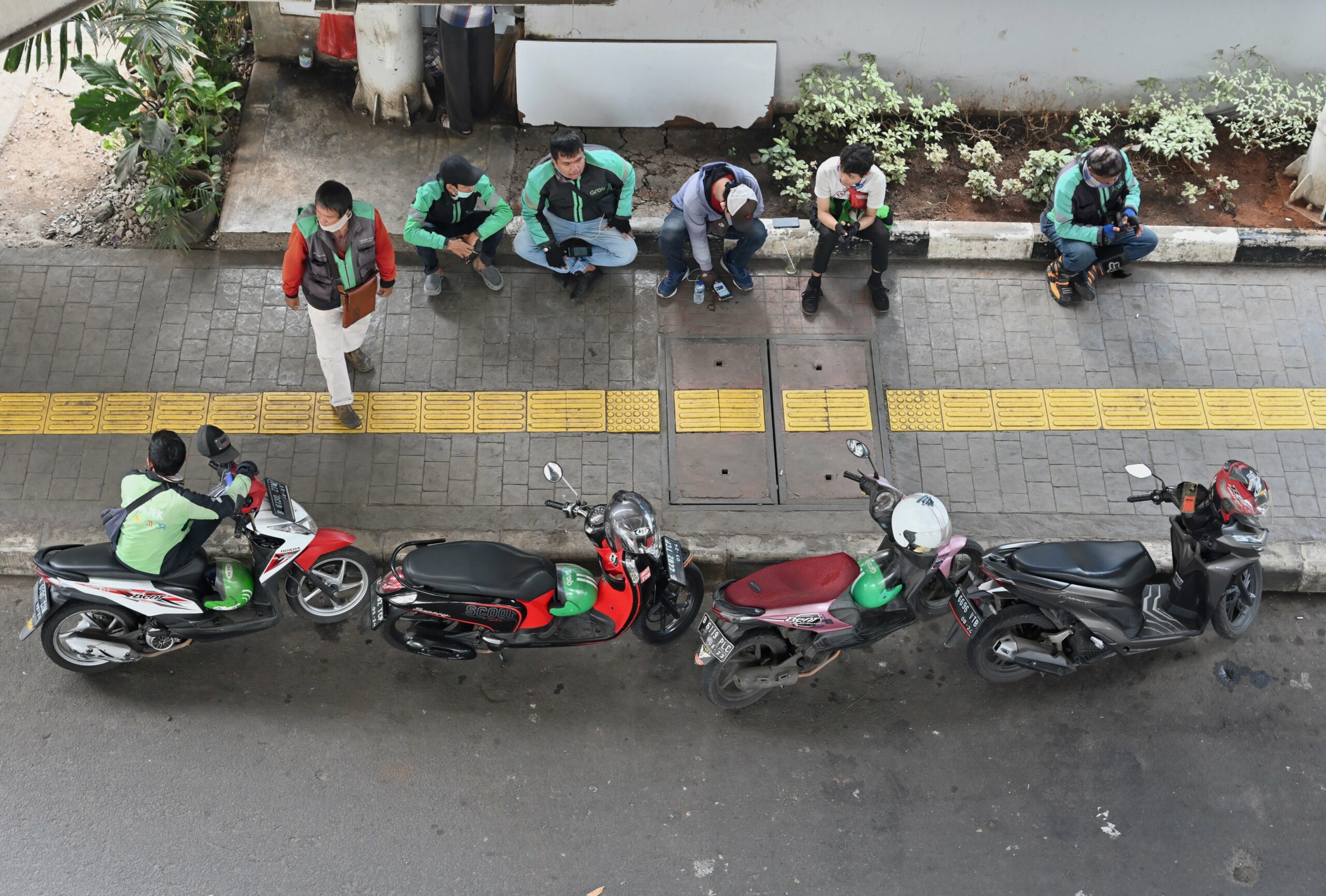 As Grab drives towards profitability, have drivers been kicked to the curb?